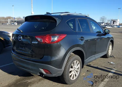 2013 Mazda Cx-5 Touring z USA, uszkodzony, nr VIN JM3KE2CE1D0145977